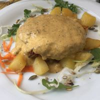 Vegetable and soy burger with roasted potatoes  at Nirvana in Florence