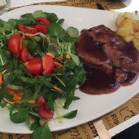 Roasted seitan with red wine sauce  at Nirvana in Florence