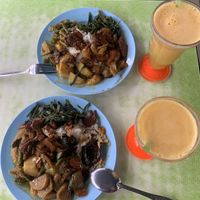 30rm 12nz $ for 2 huge plates and 2 orange juice   at Liew Chai Vegetarian in Kota Kinabalu