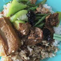 Economy rice set where you can choose 3 mains to go with rice. I got the tofu curry, gourd with some fried mock meat and stir fried mock beef.  at Nature Vegetarian in Sandakan