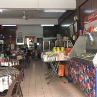 View of the restaurant. The buffet is on the right. Note that it is located upstairs (there is no signage on the ground floor).  at Nature Vegetarian in Sandakan