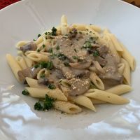Daily meal vegan mushroom pasta at Natureza in Prague