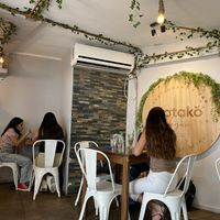 Small indoor dining room or large patio for people who like to eat smog.  at Katako Veg in Santiago