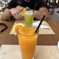 Juice: Naranja and Melón 🍊🍈  at Katako Veg in Santiago
