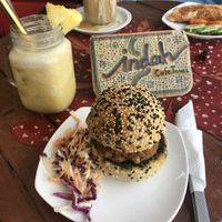 Vegan burger and pineaple, lime, coconut smoothie at Indah Cafe in Kuching