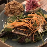 Side salad served with sandwich   at Surya Cafe in Fitchburg