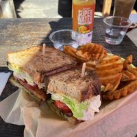 Avocado BLT with fresh bread and tempeh! Yummy waffle fries. SO Delicious!  at Spoke Bicycle Cafe in Los Angeles