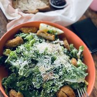 Kale caesar with breaded vegan chickenn  at Spoke Bicycle Cafe in Los Angeles