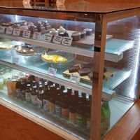 Desserts and beverages display at Green Love in Marseille