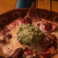 Bean and guacamole nachos  at Mexican Kitchen Bar MU in Osaka