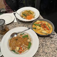 Pineapple fried rice, yellow curry, satay noodles    at Brown Grain Thai Restaurant in Ballarat