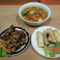 Satay sticks, spring rolls, and a very rich laksa at Peace Harmony - Erskine St in Sydney
