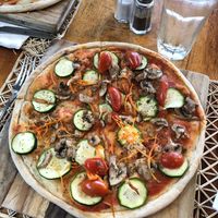 Pizza base is made without milk so we ordered the veggie pizza with out cheese at El Jardin in Puerto Ayora