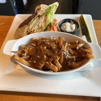 Buffalo chickn wrap with vegan pontine   at Taps Brewhouse & Grill in Niagara Falls