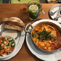 Vegan Shakshuka and tea of the house. at Michelangelo Cafe in Tel Aviv