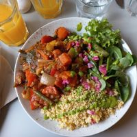 African stew served with millet and side salad at Glow in Luxembourg City