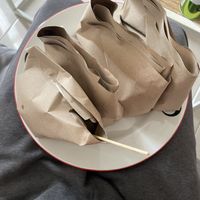 Wonderfully efficient packaging, nice and clean, never soggy. Wrapped in banana leaves inside the paper. at Warung Pande Vegan - Canggu in Canggu