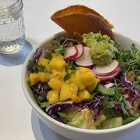 Nacho salad with coconut wrap instead of tostada  at Under the Sun Cafe in Long Beach