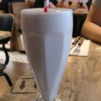Vegan strawberry milkshake made with vegan ice cream at Bread Meats Bread in Edinburgh
