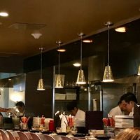 the kitchen and bar seating at Myers + Chang in Boston