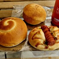 Hot dog bun, pineapple bun, and custard bun at HiPizza in Taipei