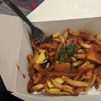 Vegan poutine! I am not 100% sure, but I think they used Chao for the cheese "curds". at Fox & Son Fancy Corndogs in Philadelphia