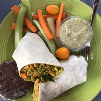 Full wrap with curry split peas, and a side of lentil hummus comes with veggies at Desert Roots Kitchen in Tempe