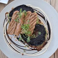 Avocado portobello toast with an extra sausage at The Beach House in Edinburgh