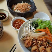Vermicelli noodlea with spring riolls and fried rice with xhilli at Metta Vegetarian in Ho Chi Minh City