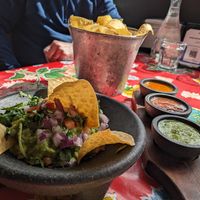 Chips and Guac. Get without cheese.  at Milagros Latin Kitchen in Redwood City