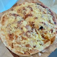 Garlic naan with cheese at Little Aladdin in Manchester