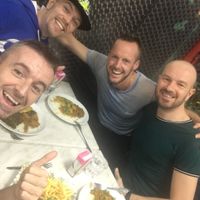 Friends sharing great food at Little Aladdin in Manchester