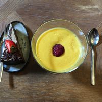 Chocolate cake with mango lassi. at Toormoor Kohvik/Galerii in Tallinn