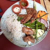 Filetes de lentejas con chimichurri con acompañamiento de arroz y verduras al grill at Andino Gastrobar in Malaga