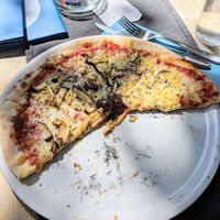 Vegan pizza with yummy cheese at Ombra Restaurant in Kotor