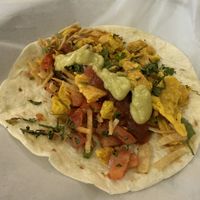 Vigas Breakfast Taco with chickpea scramblee  at Taco Ocho in Frisco