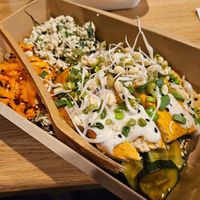 "Tṣ̌ik'n Salad" with mycoprotein, quinoa, spicy cucumber, carrot, tofu "cottage cheese", tomato, teriyaki, sprouts, ceasar sauce, sesame seeds (10.2€) at Veg Machine in Tallinn