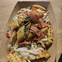 Loaded fries with chicken tenders and bacon at Veg Machine in Tallinn