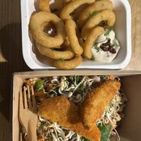glass noodle salad with chicken, and onion rings  at Veg Machine in Tallinn
