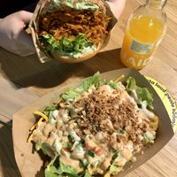 Mother Trucker Burger, Loaded Fries, and Passionfruit Lemonade   at Veg Machine in Tallinn