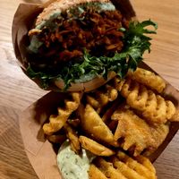 pulled sweet potato burger with waffle fries at Veg Machine in Tallinn