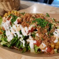 Seitan + waffle potatoes with salad and mayo, so good! at Veg Machine in Tallinn