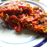 Lasagna with Mushrooms, carrot, tomato and olives. at Loving Hut - San Cristobal in San Cristobal De Las Casas