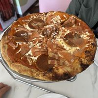 Pizza was filling but not very tastyy  at La Taqueria Vegiee in Tijuana