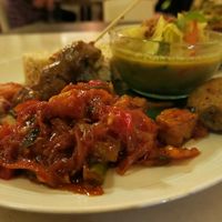 Nasi Campur is a traditional Indonesian dish. It is served with Balinese curry soup and homemade sambal. Here’s how their vegan version goes: tofu and tempeh sate with peanut. at Clear Cafe in Ubud