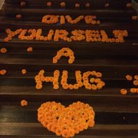 Daily changing flower message on the stairs!  at Clear Cafe in Ubud