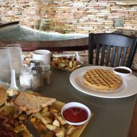 Vegan waffles w/ rice paper bacon & home fries! Yeah baby! at Water Garden Cafe in Cleveland