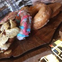 Vegan donuts, left to right: couch potato, cotton candy mouth, vanilla glazed, Carolina sand. at Wake N Bake Donuts in Wilmington