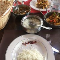 Plain naan, vegetable curry, aloo gobi, white rice. Not pictured: onion bhaji. at Curry Park in Crete