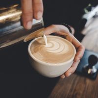 Drinks served with latte art at Bakeliet Kaffee in Kiel
